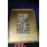 A SIGNED CONTINENTAL WATERCOLOUR OF A STREET SCENE gold mounted in slender frame