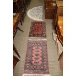 THREE VARIOUS SMALL SIZED RUGS, ONE ORIENTAL DEMI LUNE ON WITH TASSLED FRINGE
