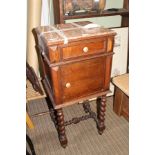 A 19TH CENTURY FRENCH OAK BEDSIDE POT CUPBOARD WITH ROUGE MARBLE TOP on barley twist and block