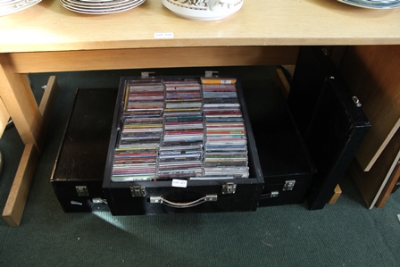 THREE WOODEN DJ CRATES CONTAINING A LARGE SELECTION OF CD SINGLES