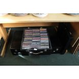 THREE WOODEN DJ CRATES CONTAINING A LARGE SELECTION OF CD SINGLES