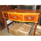 A REPRODUCTION YEW WOOD SIDE TABLE with crossbanded top, fitted three inline drawers