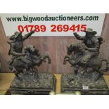 A PAIR OF CAST, PROBABLY SPELTER FIGURES of mounted Cavaliers on rock work plinth bases