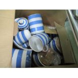 A BOX CONTAINING A GOOD SELECTION OF BLUE AND WHITE BANDED CORNISH KITCHEN WARE