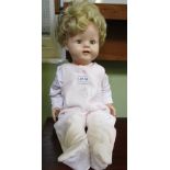 A 20TH CENTURY ARTICULATED BLOND HAIRED DOLL