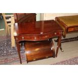 A WELL MADE REPRODUCTION SERPENTINE FRONTED SIDE TABLE having two inline drawers on plain tapering