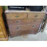 A 19TH CENTURY OAK FINISHED CHEST OF FIVE DRAWERS