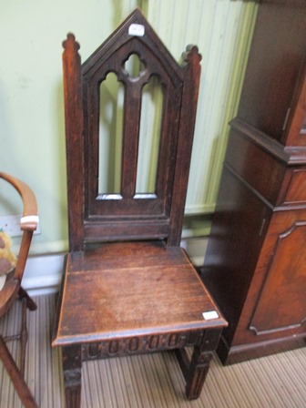 A GOTHIC DESIGN CHURCH WINDOW BACKED SOLID SEATED CHAIR