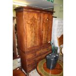 A MADE UP 19TH CENTURY MAHOGANY CHEST, the upper section having two flame panelled cupboard doors