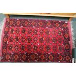 A SMALL WOVEN WOOLLEN FLOOR RUG standard geometric pattern