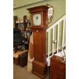 A 19TH CENTURY PLAIN OAK LONG CASE CLOCK WITH PAINTED DIAL bearing the legend 'Bates of Cuckfield'