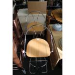 A PAIR OF MODERN CHROME FRAMED BAR STOOLS, WITH BLONDE WOOD SEATS