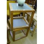 A PAIR OF TIGER WOOD FRAMED LAMP TABLES with frosted glass insert tops