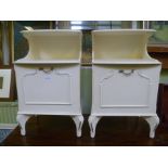 A PAIR OF OFF WHITE PAINTED BEDSIDE UNITS