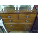 A 19TH CENTURY MAHOGANY CHEST OF DRAWERS with plain top over two inline and three graduating full