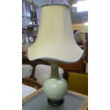 AN ORIENTAL DESIGN CELADON GLAZED POTTERY TABLE LAMP