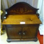 A MAHOGANY TABLE TOP CABINET with decorative lyre inlaid back and two cupboard doors