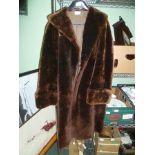 A BROWN FUR COAT