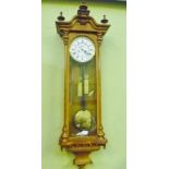 AN EARLY 20TH CENTURY WOOD AND GLASS VIENNESE HANGING WALL CLOCK with display weights and pendulum