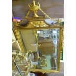 A REPRODUCTION WILLIAM KENT DESIGN FANCY GILT FRAMED WALL MIRROR bevelled with decorative cut
