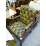 A REPRODUCTION AGED LEATHER EFFECT UPHOLSTERED GAINSBOROUGH STYLE ARMCHAIR with show wood frame