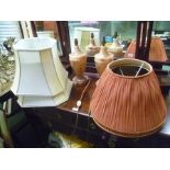 A PAIR OF QUALITY TURNED ALABASTER TABLE LAMPS together with TWO PAIRS OF SHADES