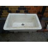AN UNUSUAL ANGULAR BELFAST STYLE SINK together with an OLD STAFFORDSHIRE PORCELAIN TOILET CISTERN