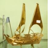 A POLISHED BRASS MODEL OF A STYLISED JUNK