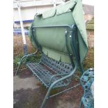 A GREEN FINISHED METAL GARDEN SWING for at least two people