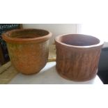 TWO TERRACOTTA GARDEN PLANTERS one invert bell shaped, the other cast with dancing figures