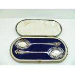 JOHN ROUND & SON LTD. A PAIR OF SILVER SALAD SERVING SPOONS, having pierced decorative bowls and