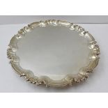 WILLIAM HUTTON & SONS A CHIPPENDALE STYLE SILVER SALVER having cast and applied half round pie-crust