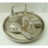 A COLLECTION OF TEN SILVER MOUNTED DRESSING TABLE ITEMS, includes a hand vanity mirror, cut glass