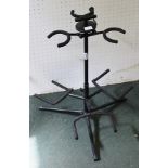 AN ADJUSTABLE METAL GUITAR STAND to hold 3 instruments