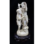 A JAPANESE MEIJI PERIOD IVORY CARVING depicts two fishermen, one with a spear looking out to sea,