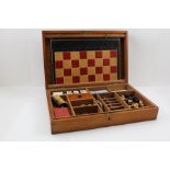 AN EARLY 20TH CENTURY MAHOGANY CASED GAMES COMPENDIUM, fitted with a folding leather covered board
