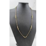 A 9CT GOLD NECKLACE of fancy link design, weight 17g