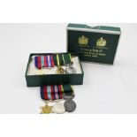 TWO SET OF DRESS MEDAL MINATURES mounted on ribbons and a TERRITORIAL MEDAL, cased
