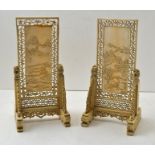 A PAIR OF CHINESE IVORY TABLE SCREENS, Qing dynasty, each panel carved in low relief with