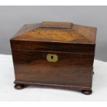 A 19TH CENTURY ROSEWOOD TEA CADDY, the hinged cover opening to reveal two inner lidded compartments,