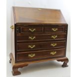 A 20TH CENTURY MAHOGANY COLLECTOR'S CABINET in the form of a Georgian fallfront writing bureau