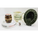 A "WILLS'S WOODBINE CIGARETTES" BAR TOP WATER JUG, a "Whitbread & Co." ashtray, a reproduction