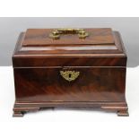 AN 18TH CENTURY MAHOGANY TEA CADDY, the hinged cover with decorative brass handle, re-fitted