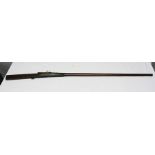 AN INDIAN MATCHLOCK MUSKET, overall length 174cms, barrel length 124cms. Stamped JPR/EXR/2/4972,