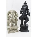 TWO INDIAN HINDU CARVED WOOD AND PAINTED DEITIES, includes Ganesh, the elephant head God,