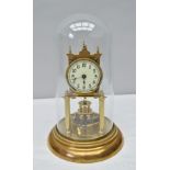 AN EARLY 20TH CENTURY BRASS ANNIVERSARY CLOCK with circular dial, having Arabic numerals, dial