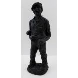 A FIGURE OF A COAL MINER, labelled to base, "Made with coal from Tower Colliery, Wales", 32cm high