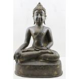 A 17TH CENTURY BRONZE THAI AYUTTHAN BUDDHA in meditative seated pose, with remains of gilding,