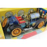 A SCHUCO "OLD TIMER" MERCER TYP 35J/1913 TIN-PLATE CLOCKWORK TOY CAR, 18cm long, in original box