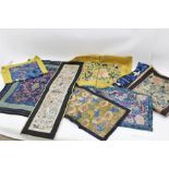 A COLLECTION OF CHINESE EMBROIDERED PANELS to include; a yellow panel embroidered with peonies and